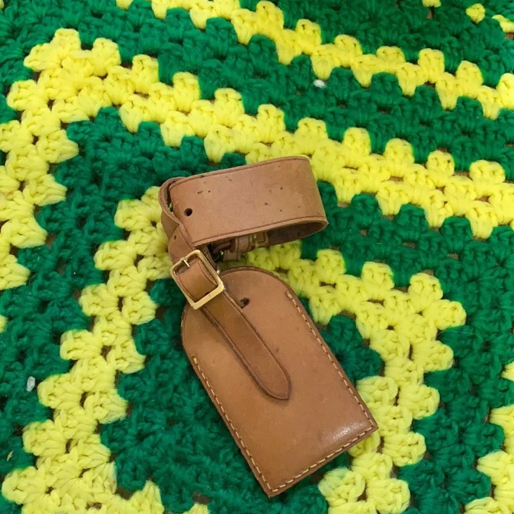 Louis Vuitton luggage tag and poi get